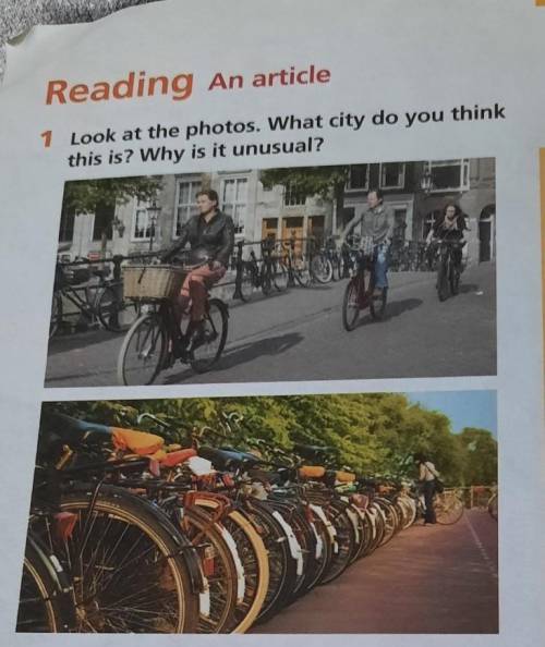 1 Look at the photos. What city do you thinkthis is? Why is it unusual?